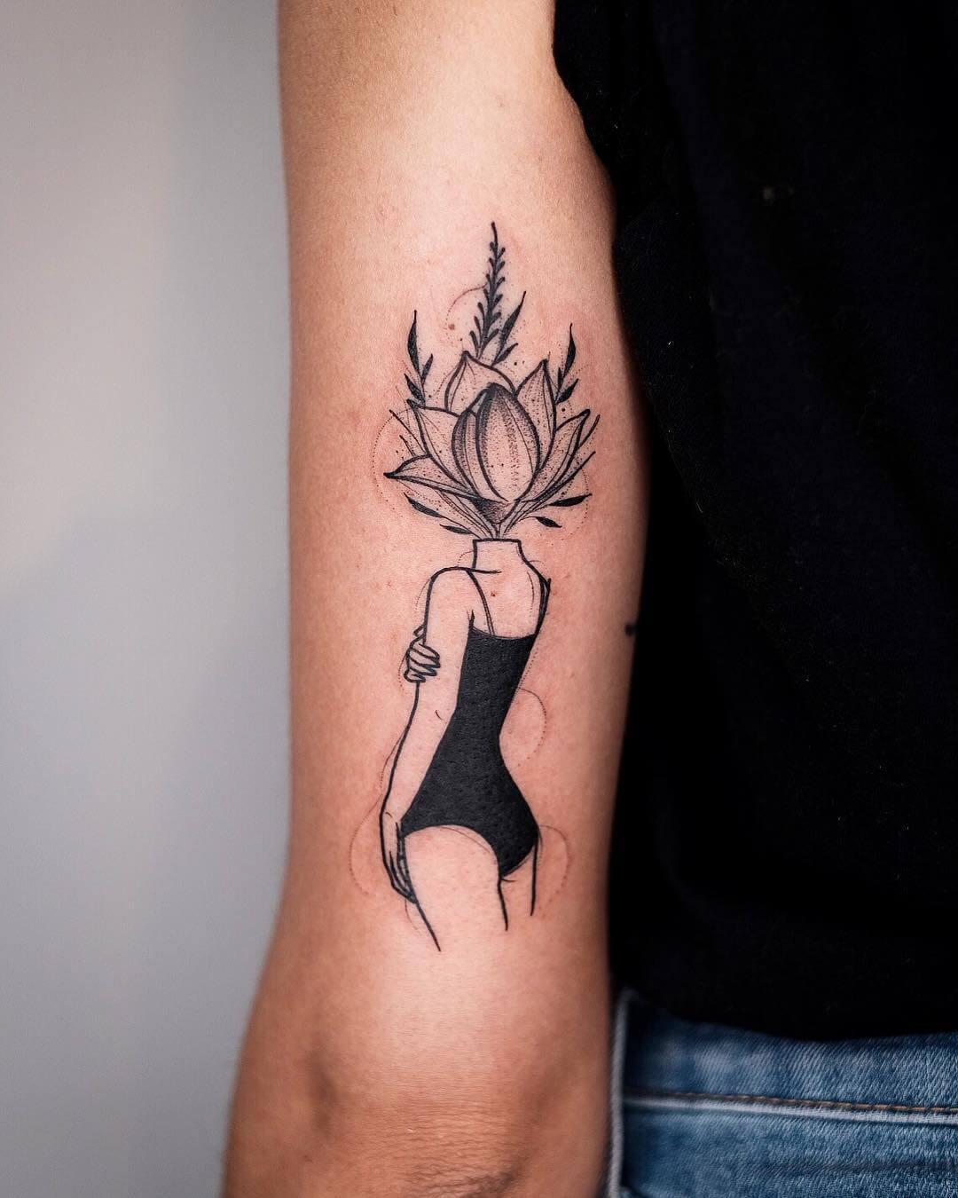 Female body with flowers as head